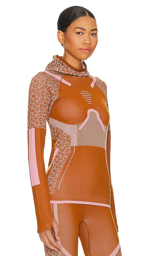 adidas by Stella McCartney True Strength Seamless Yoga Longsleeve Hood in Burnt Orange